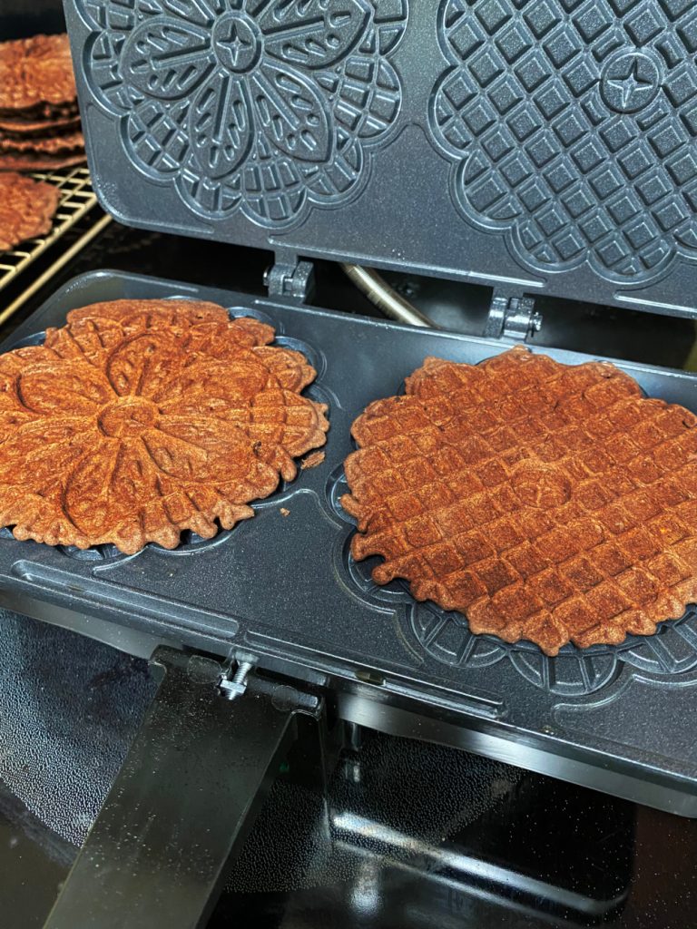 chocolate mint pizzelles on griddle