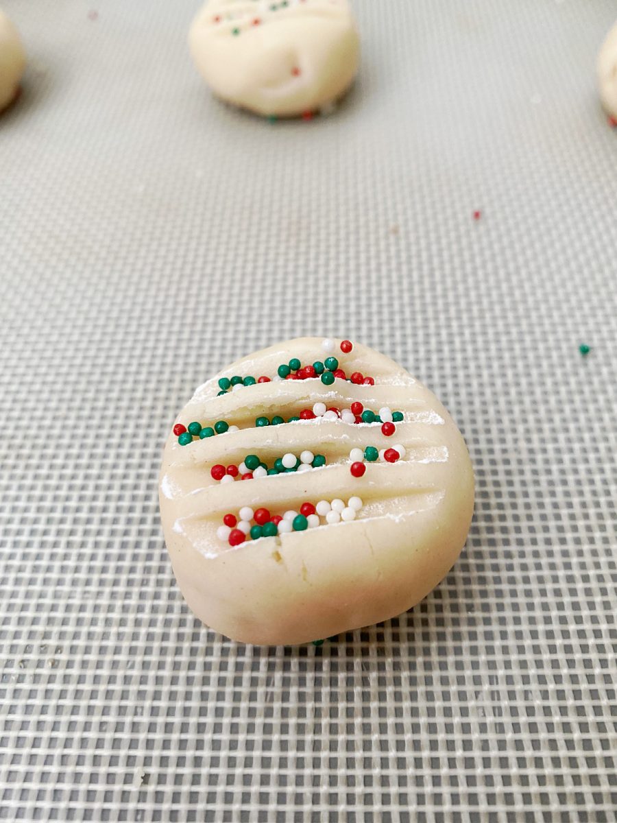 shortbread cookie dough ball with sprinkles ready to bake