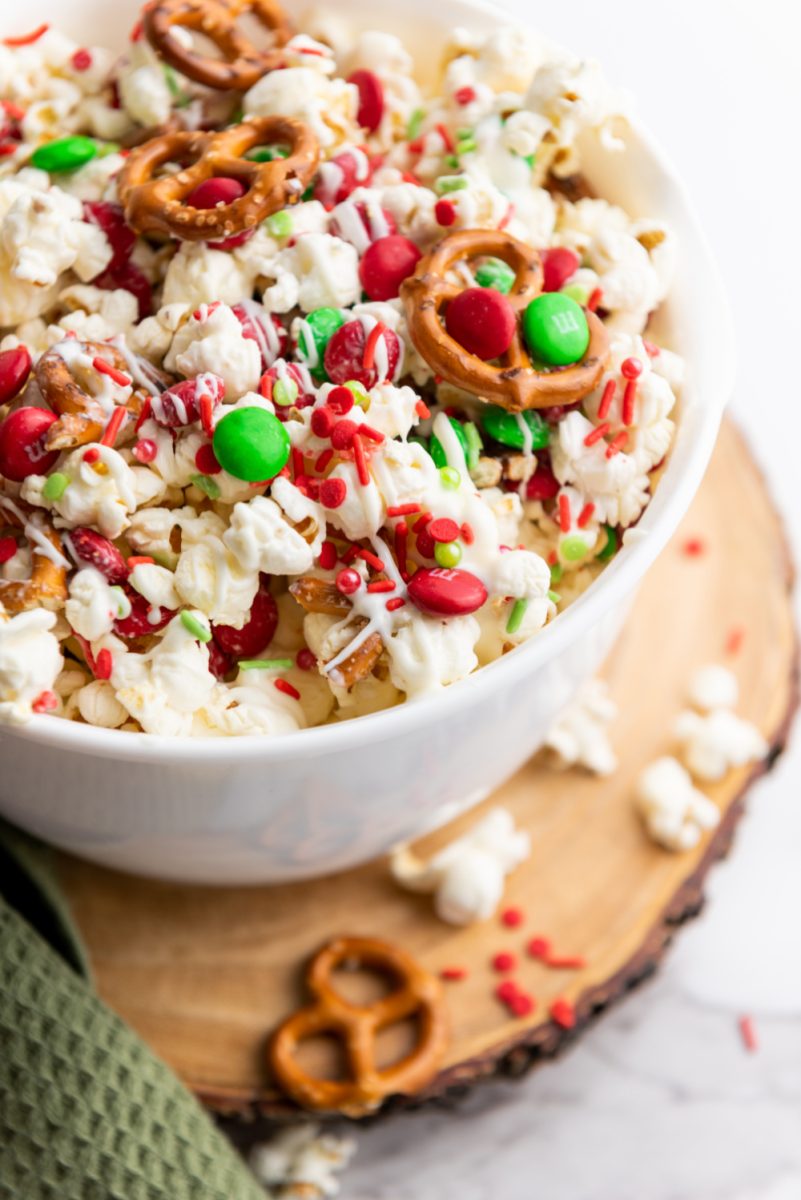 white bowl filled with sweet and salty popcorn mixture