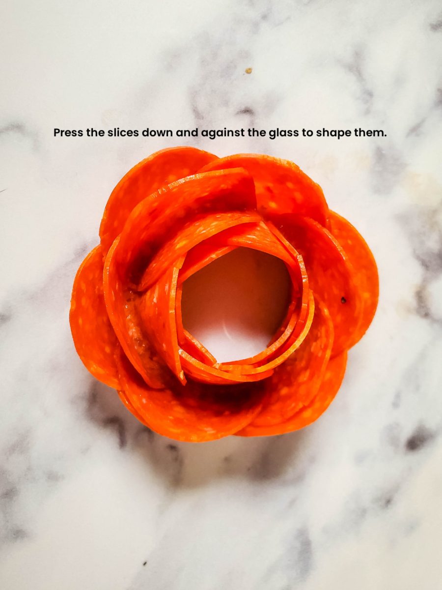 forming the pepperoni rose