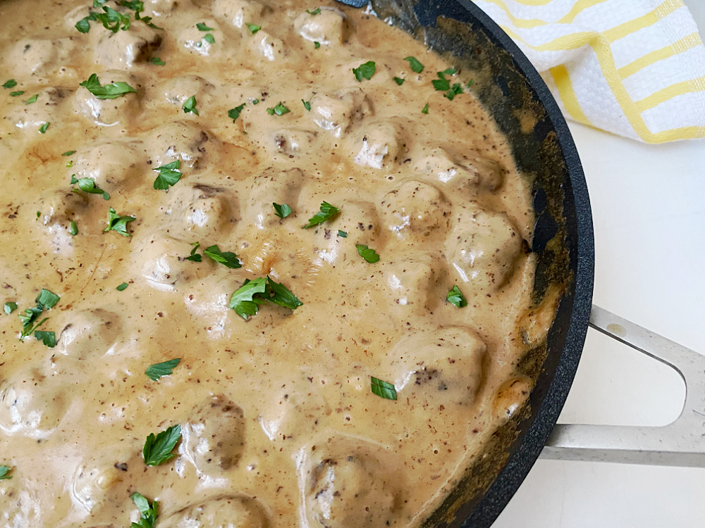 close up of classic Swedish Meatballs in skillet