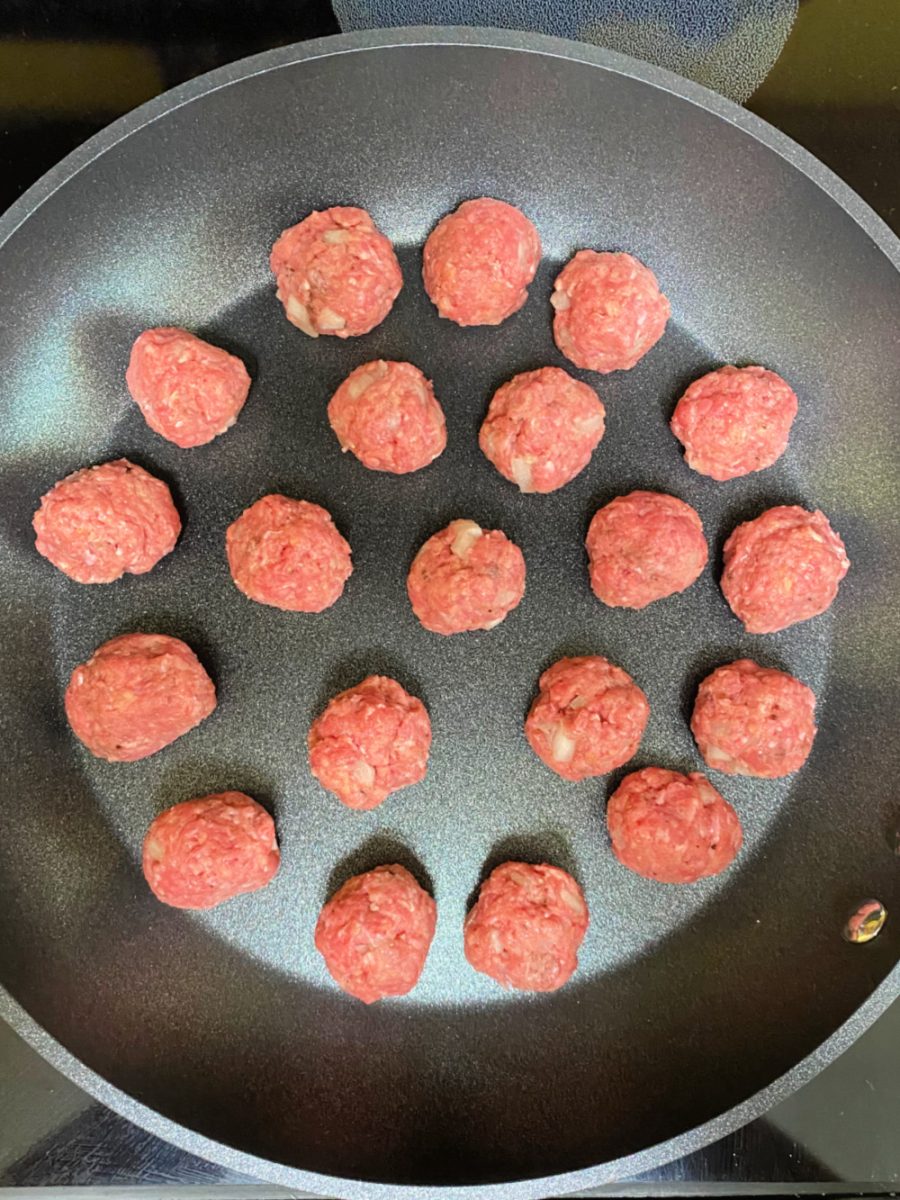 skillet with meatballs frying