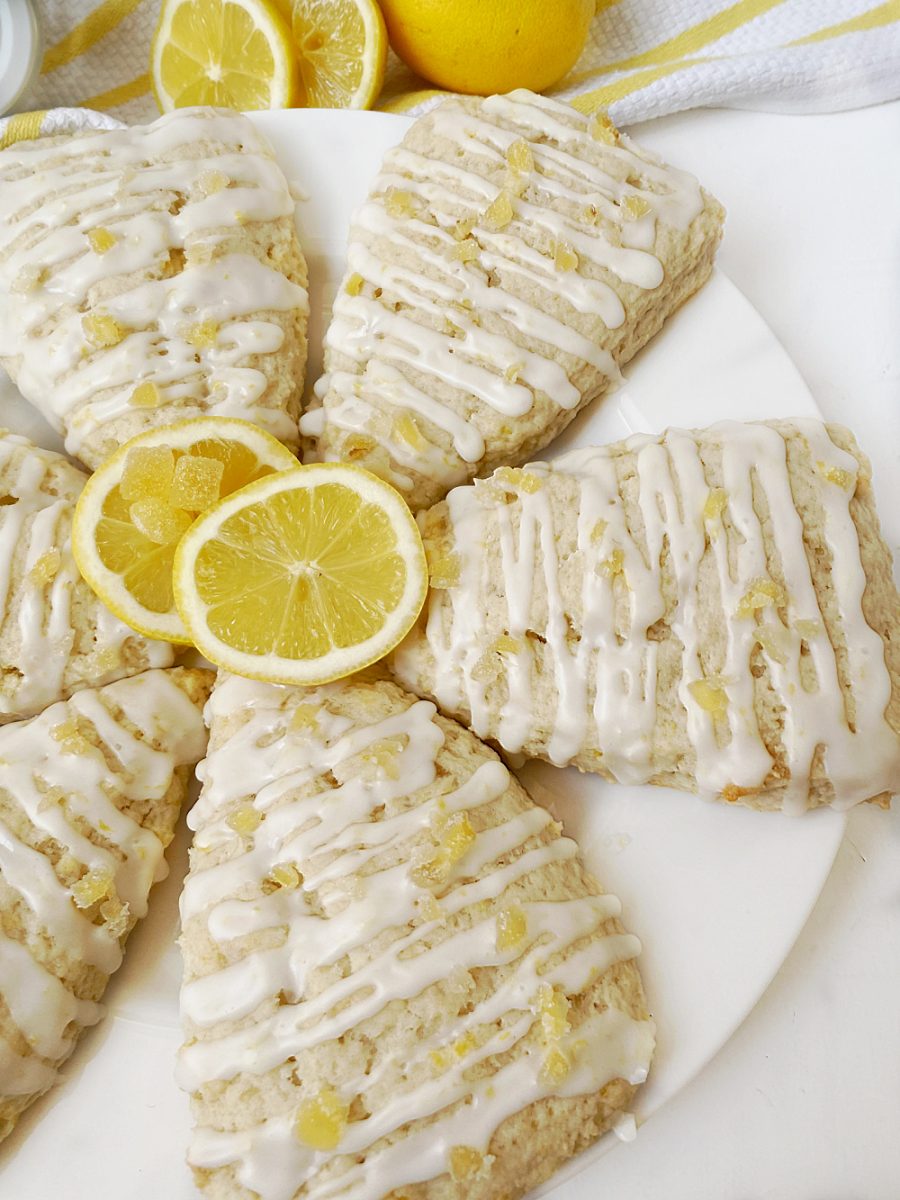close of lemon ginger scones on white plate
