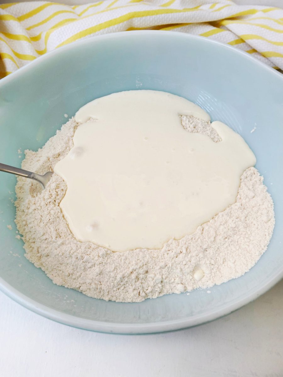 large bowl with cream and flour mixture for scones