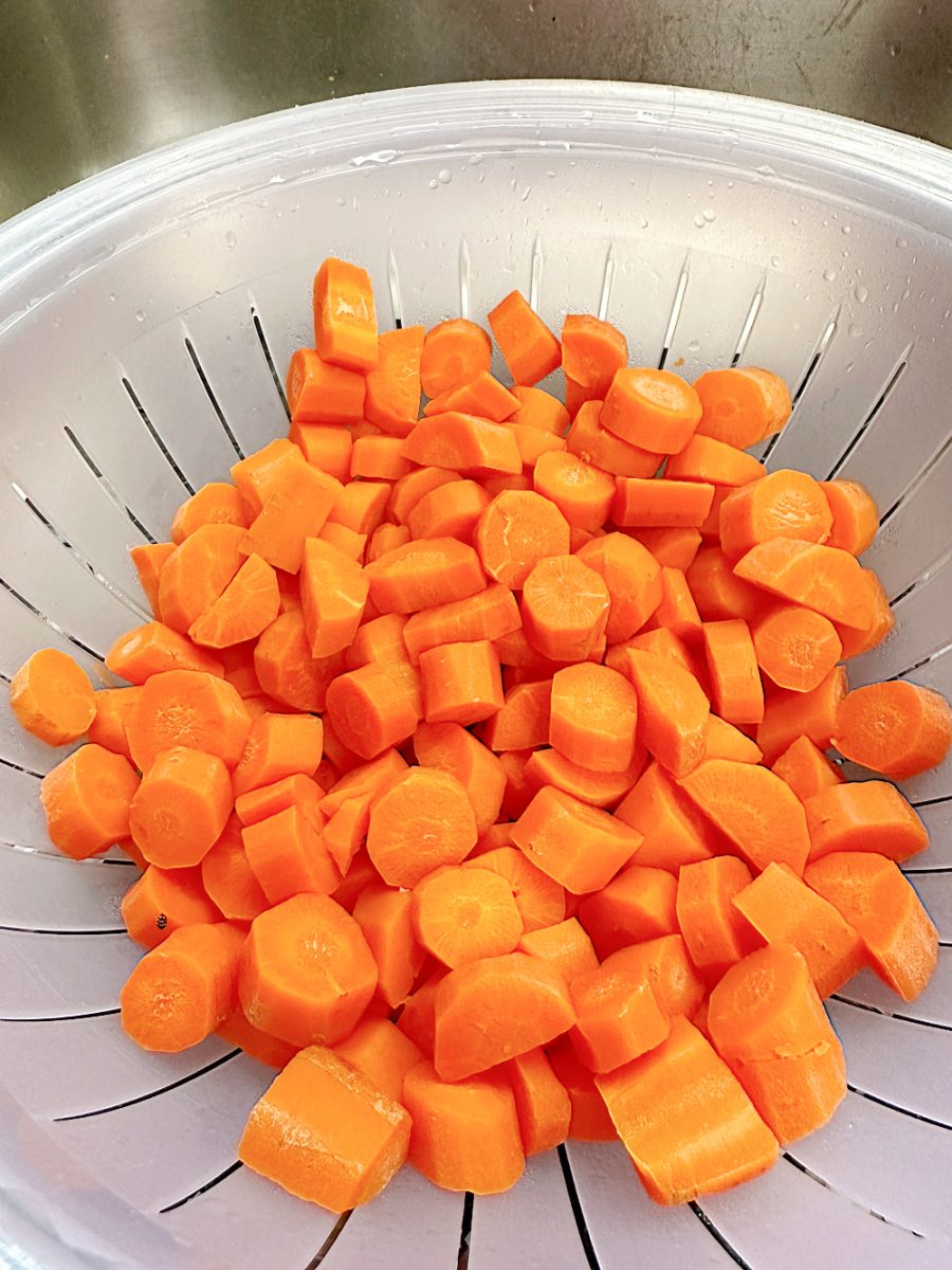 steamed carrots in strainer