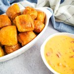soft pretzel bites with cheese dip ready to eat