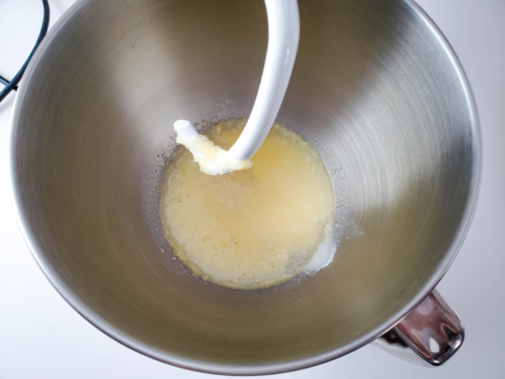water, yeast, and butter in bowl of stand mixer
