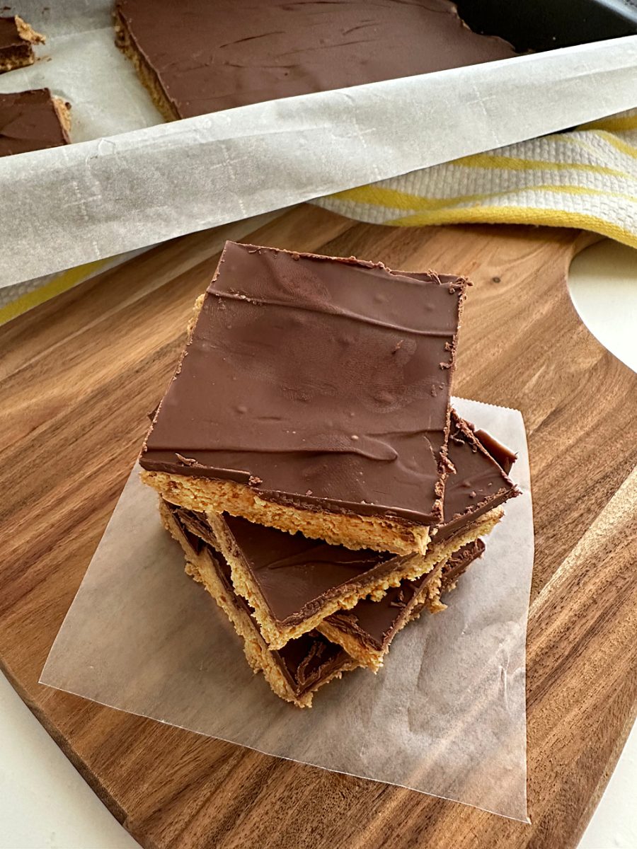 easy to make no bake peanut butter bars cut into squares and stacked