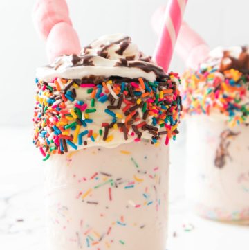 easy to make vanilla bean funfetti milkshake in glass with straw