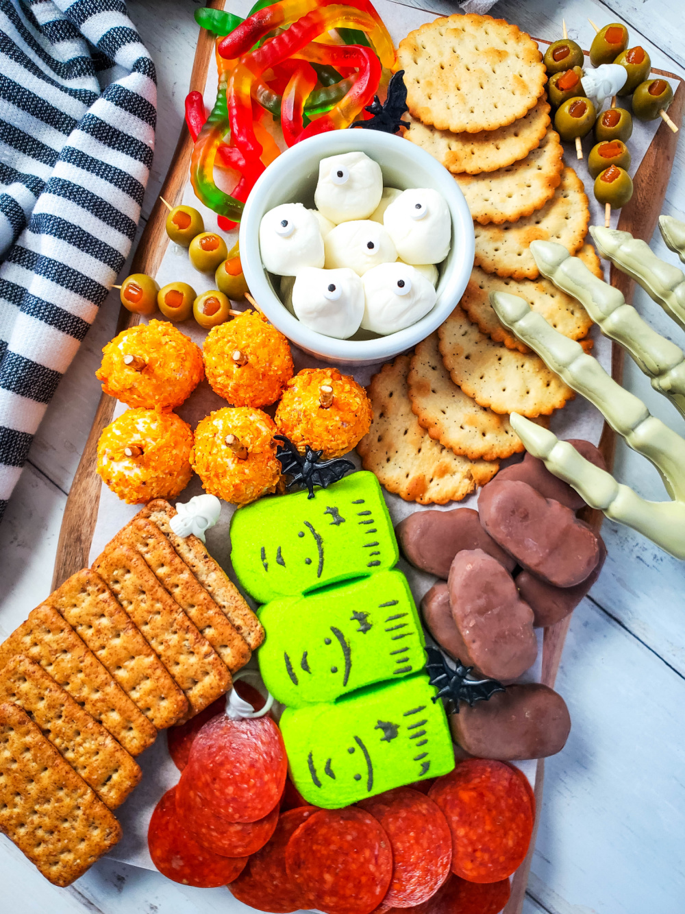 sweet and savory halloween charcuterie board with props