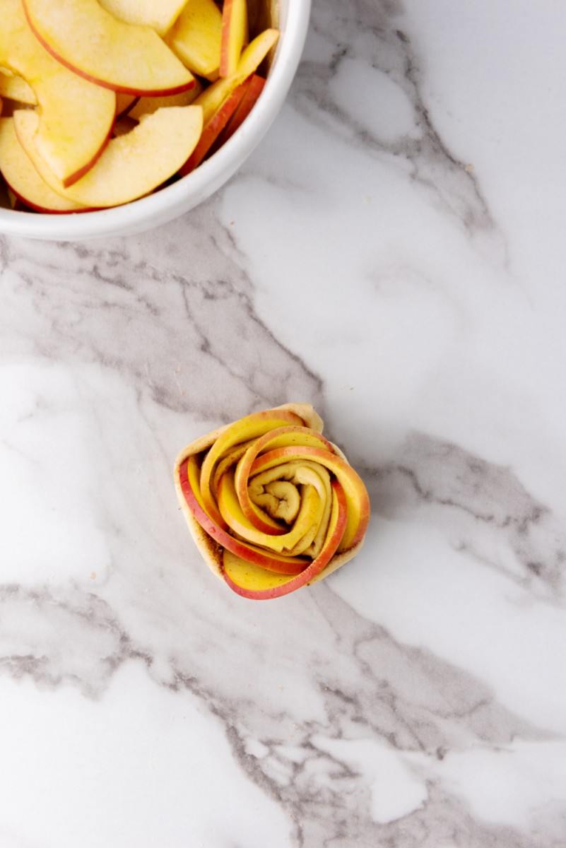 roll up apples into a rose shape