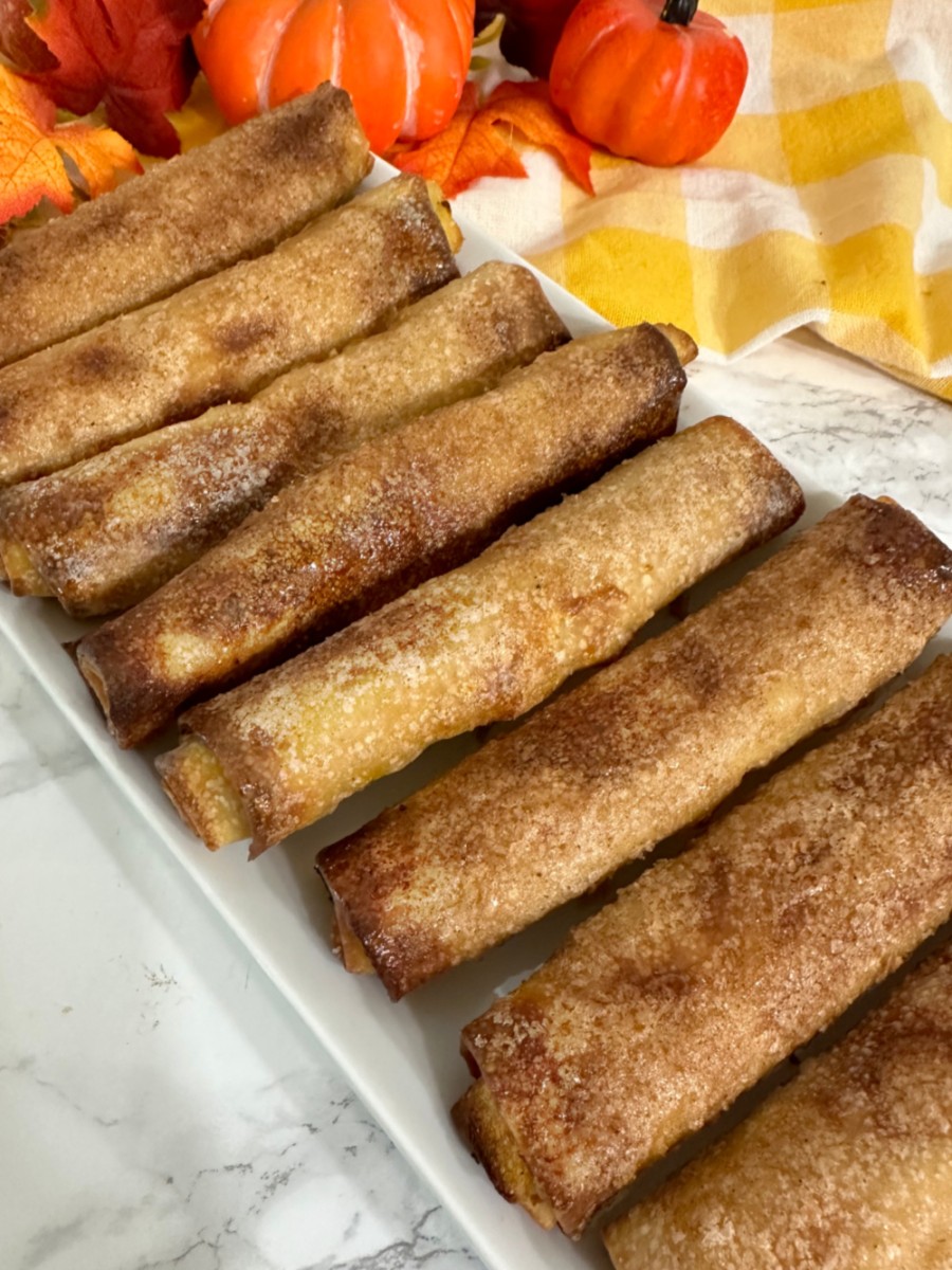 close up of pumpkin cheesecake egg rolls made in the air fryer