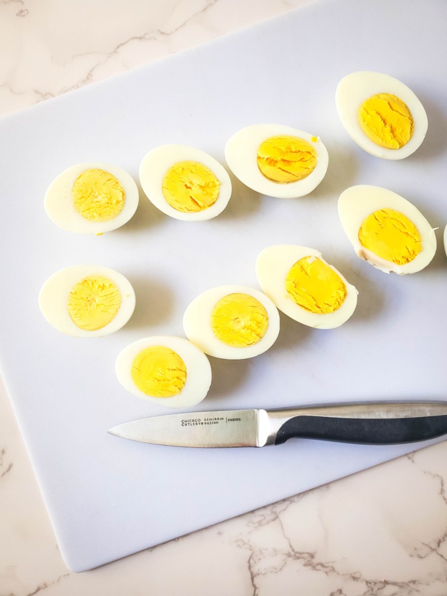 cut hard boiled eggs in half with knife
