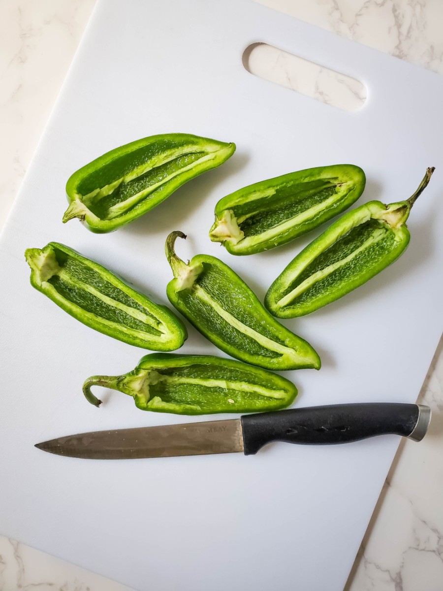 cut jalapenos in half and deseed