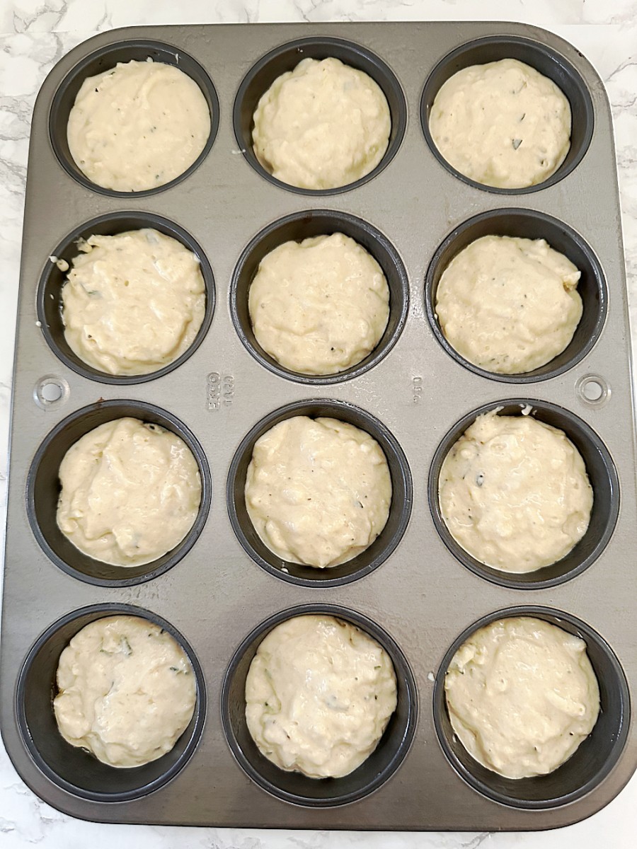 muffin batter in muffin cups ready to bake