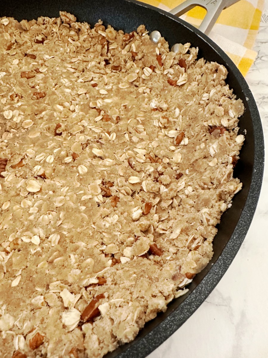 oat mixture crust in oven safe skillet