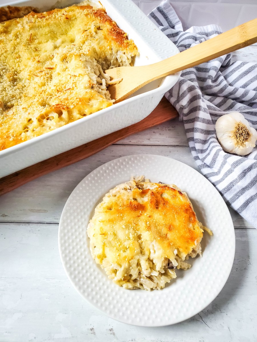 easy turkey tetrazzini casserole with serving on white plate