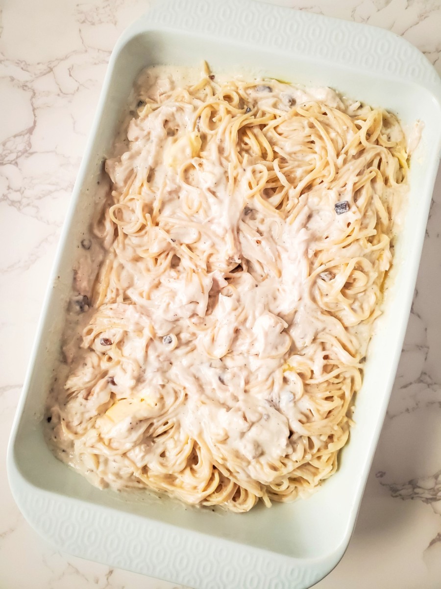 pour turkey and pasta mixture in to baking dish