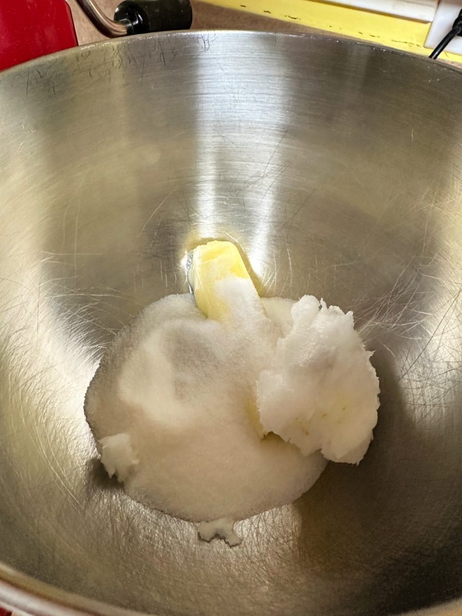 butter sugar and coconut oil in stand mixer bowl