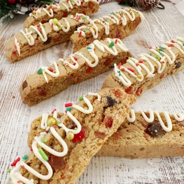 fruitcake biscotti with white chocolate and sprinkles