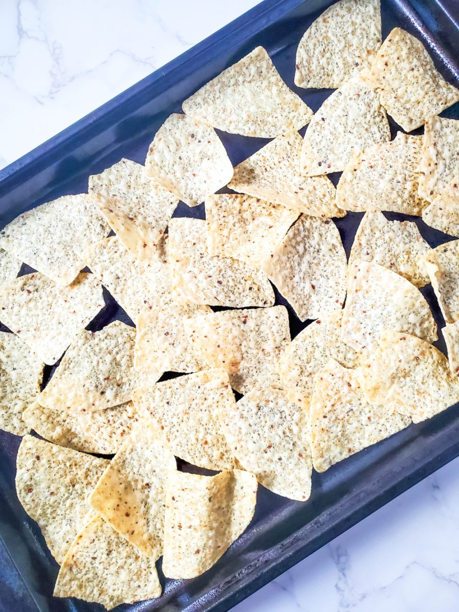 place nacho chips on sheet pan