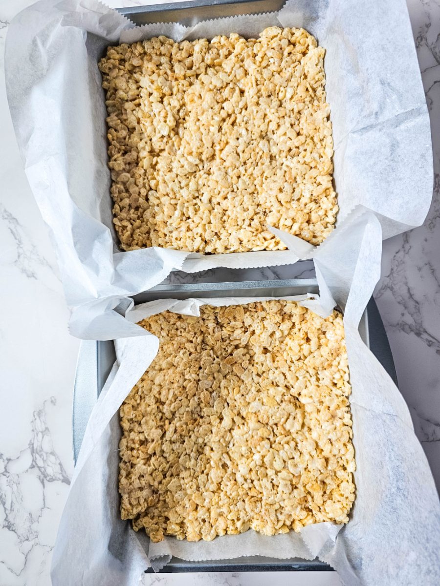 press rice cereal mixture in baking pan and let it cool