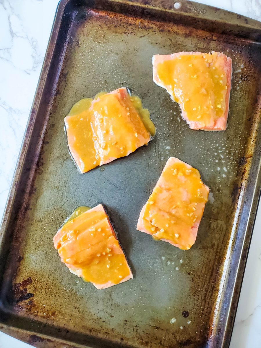 pour glaze over salmon on pan