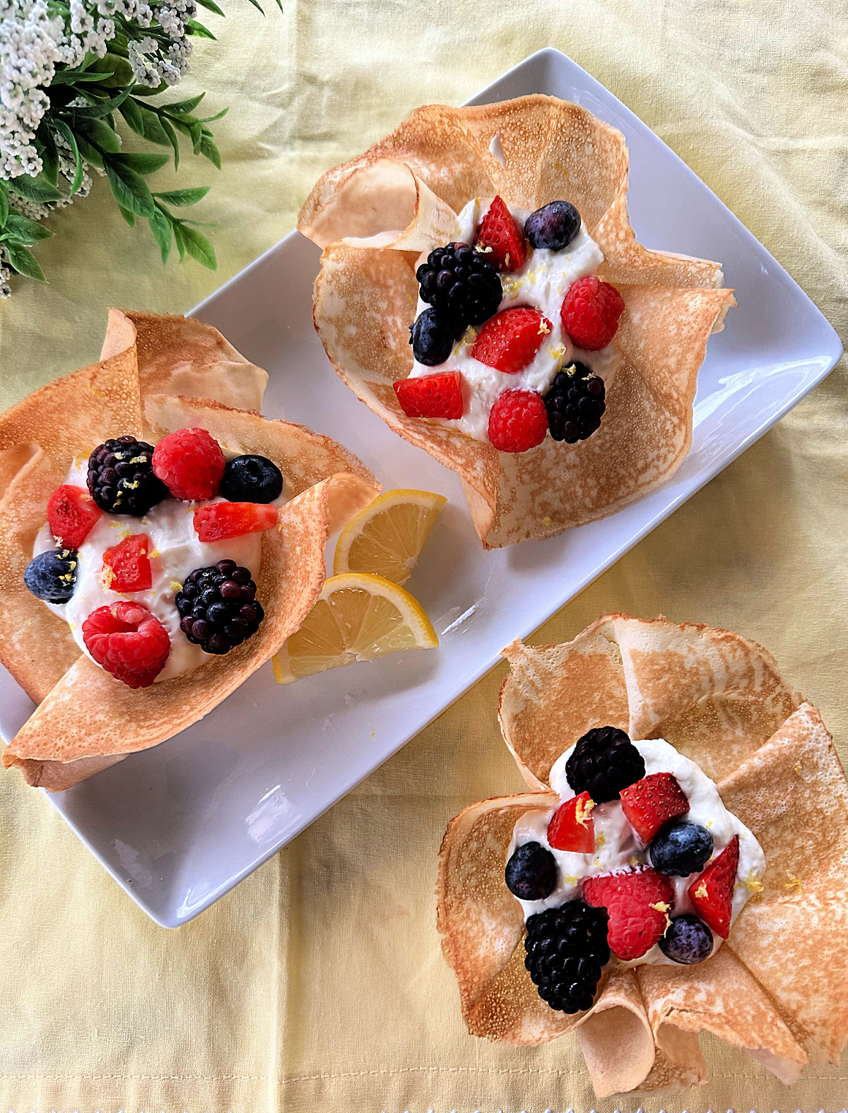 3 lemen mousse with berries in crepe bowls