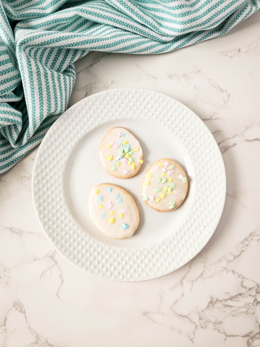 Easter Egg Cutout Cookies on white plate