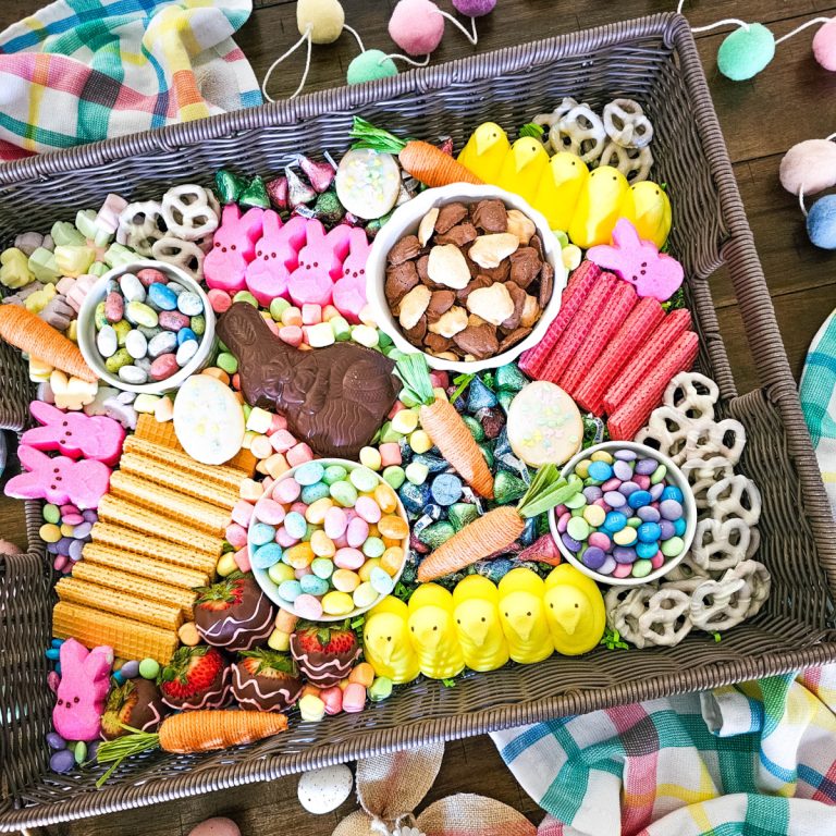 feature image for the Easter Candy Charcuterie board.. Seasonal themed candy in a brown wicker tray.
