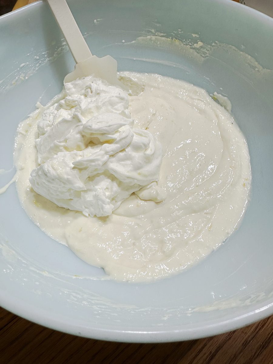 fold cream into lemon mixture in bowl