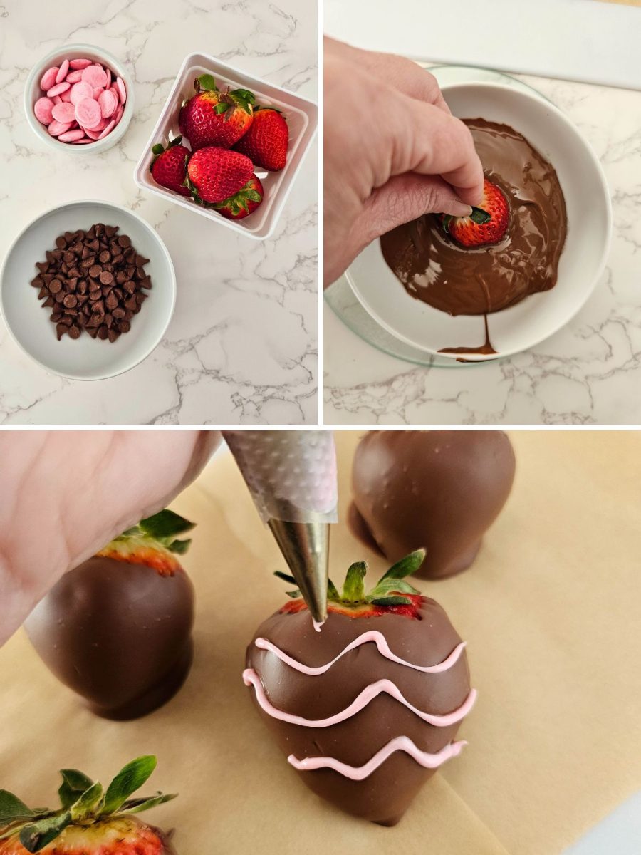 A hand dips a fresh strawberry into a bowl of melted chocolate.