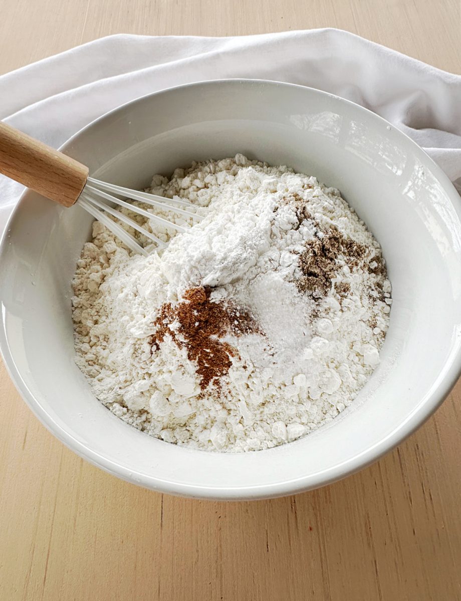 mixing dry ingredients in white bowl