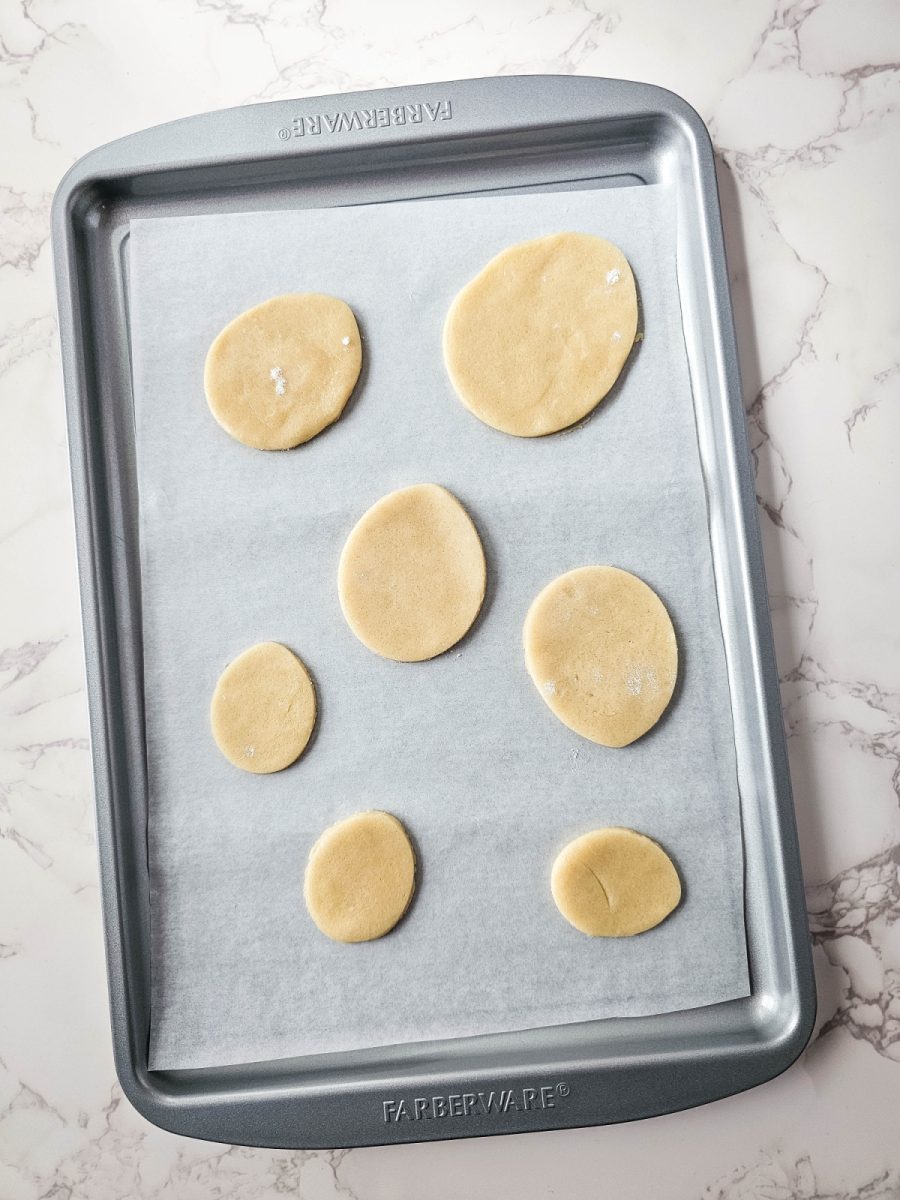 place cookie shapes on baking tray