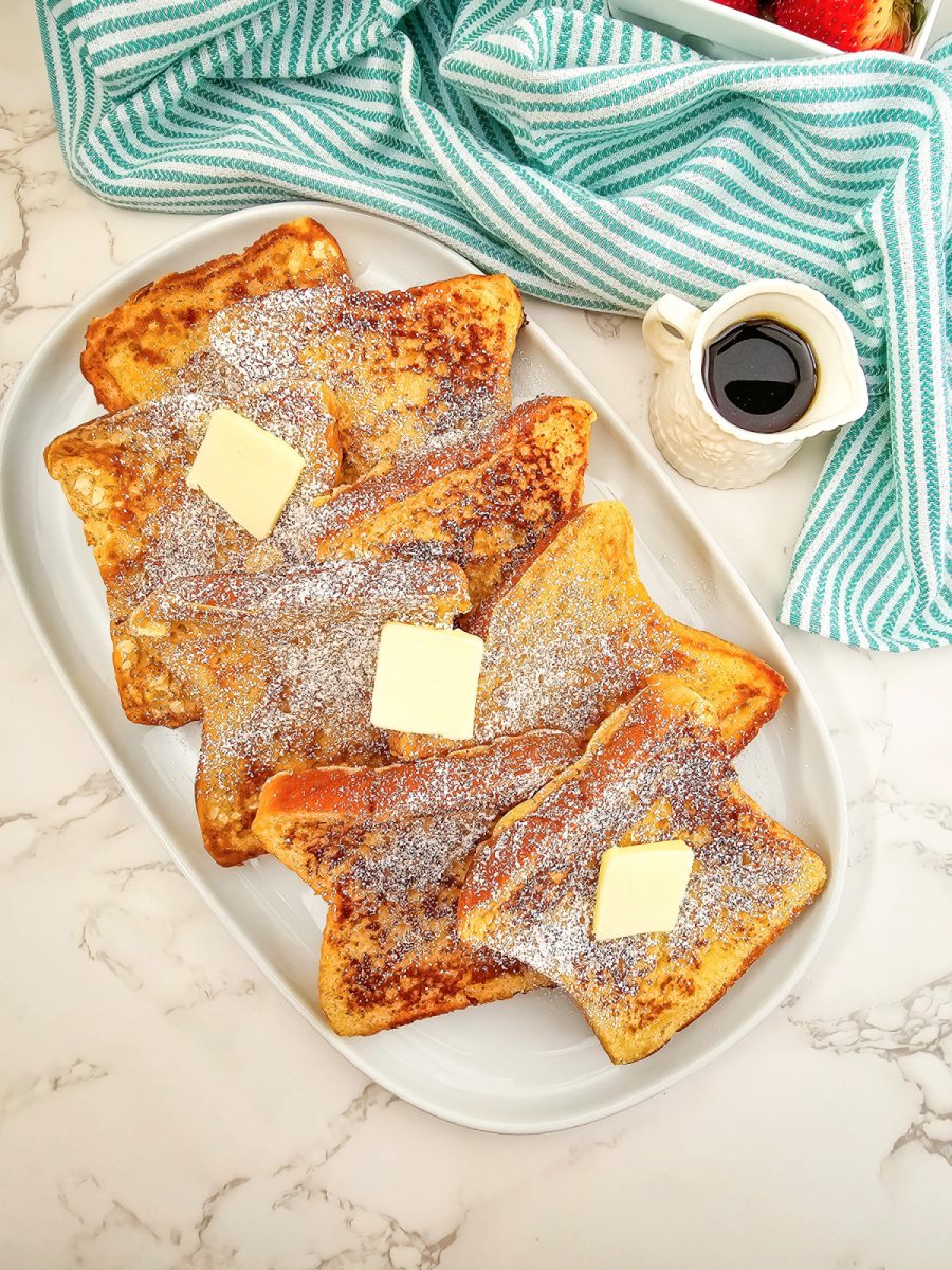 add pats of butter and serve french toast with syrup