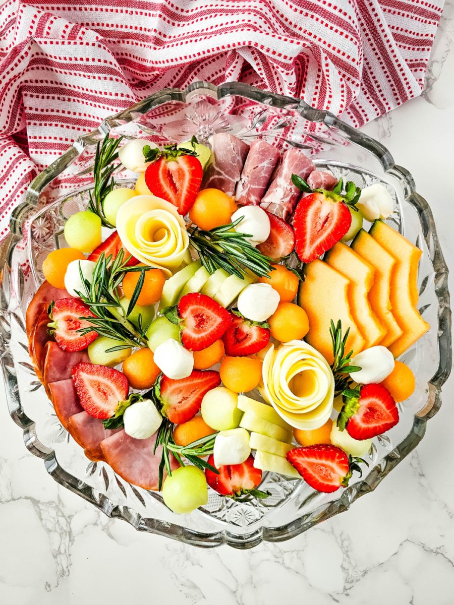 overhead view of charcuterie tray with fruits