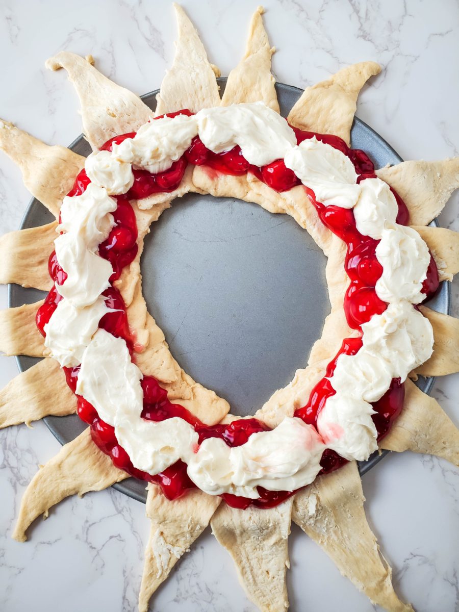 spread cream cheese filling over cherries