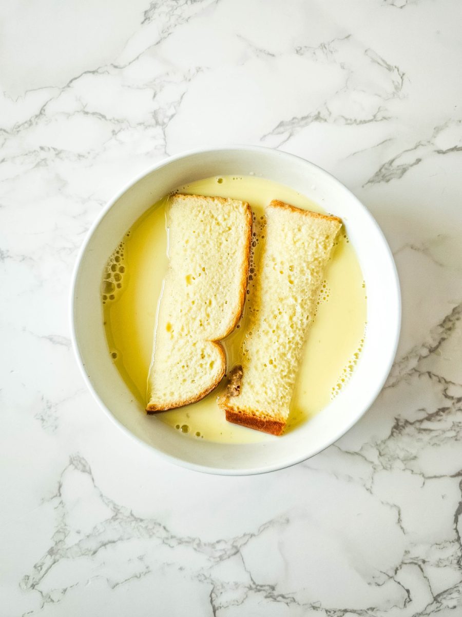 coat slices of bread with egg batter