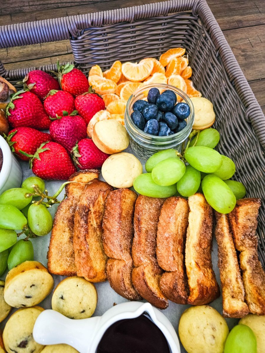 french toast sticks with fruit on platter