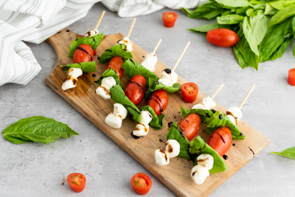 caprese kabobs on wooden board