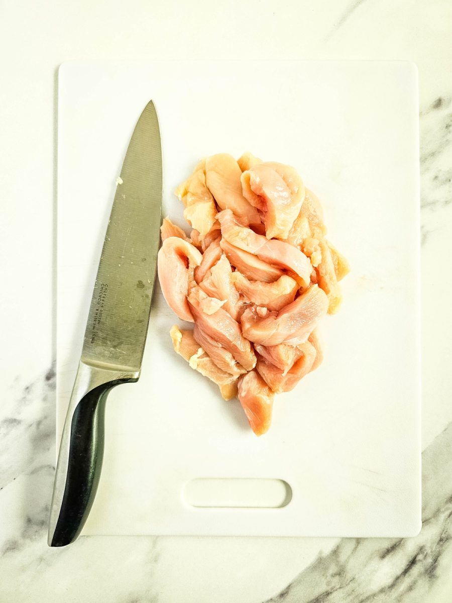 chicken slices on cutting board