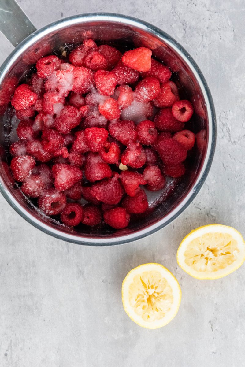 cooking the raspberries down in saucepan