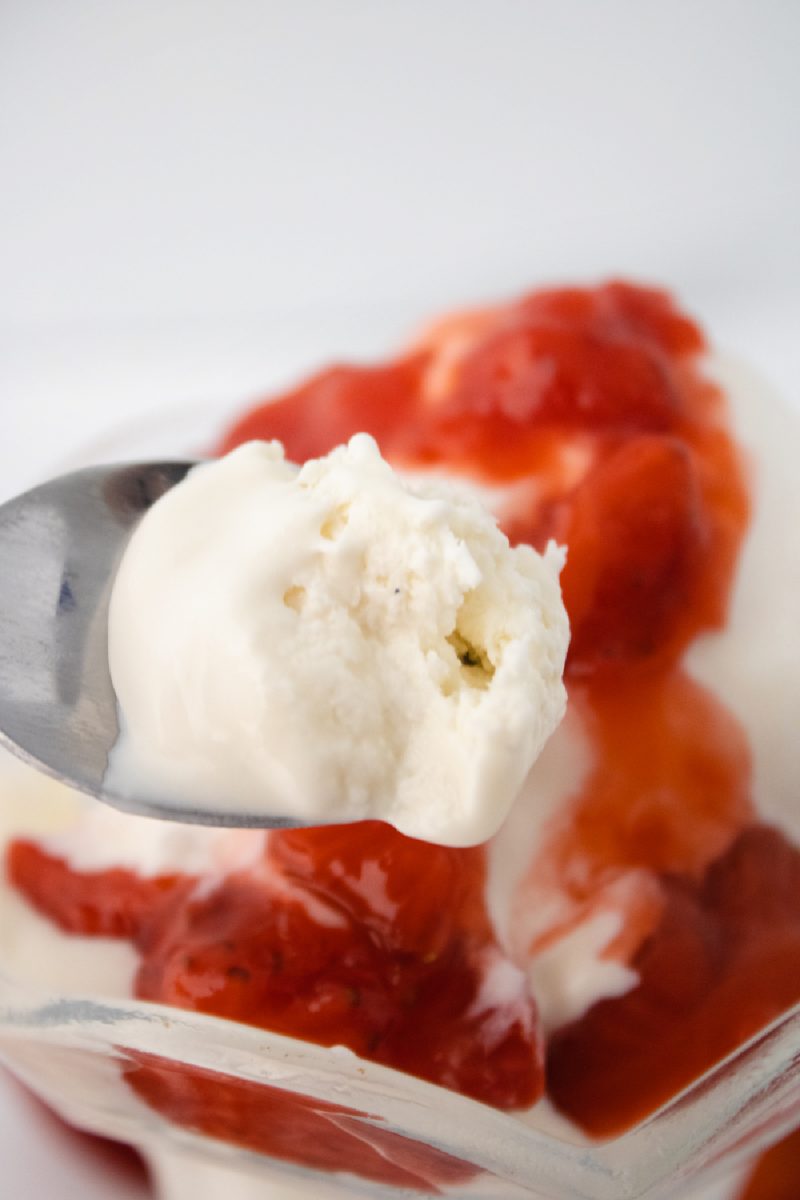 spoonfiul of ice cream with strawberries