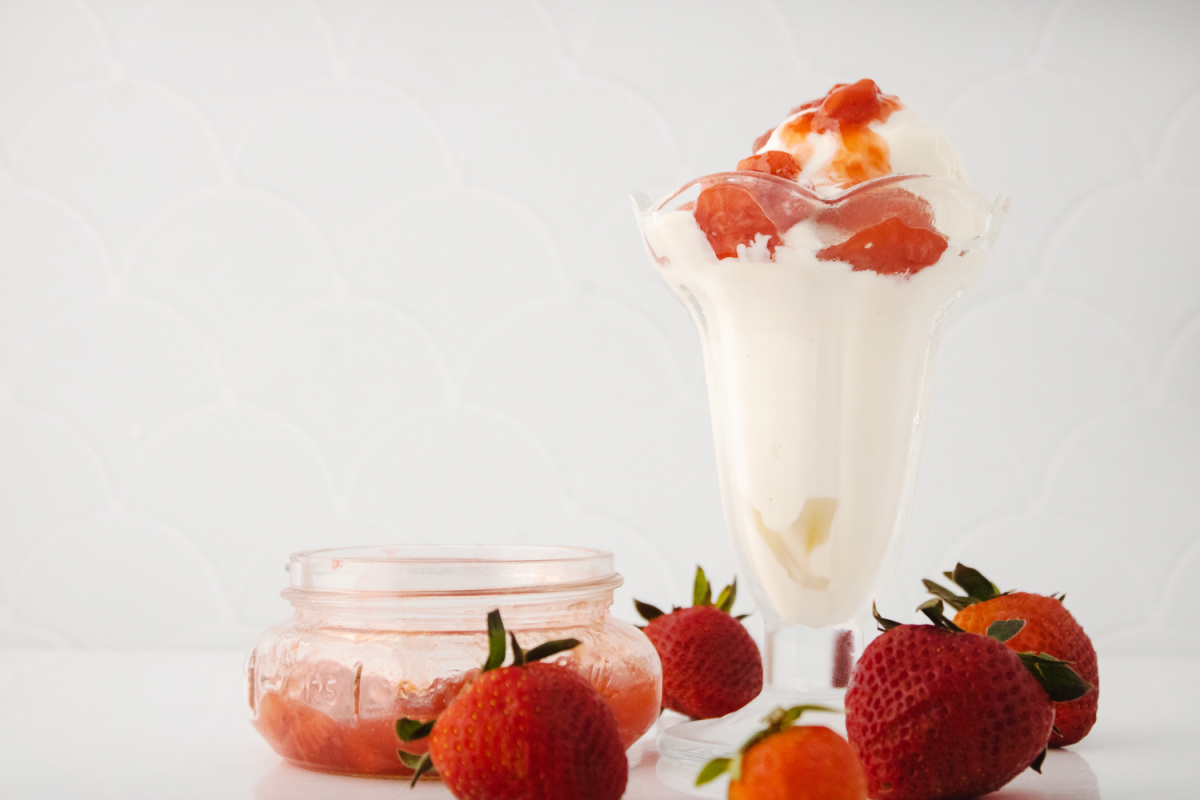 strawberry preserves over ice cream