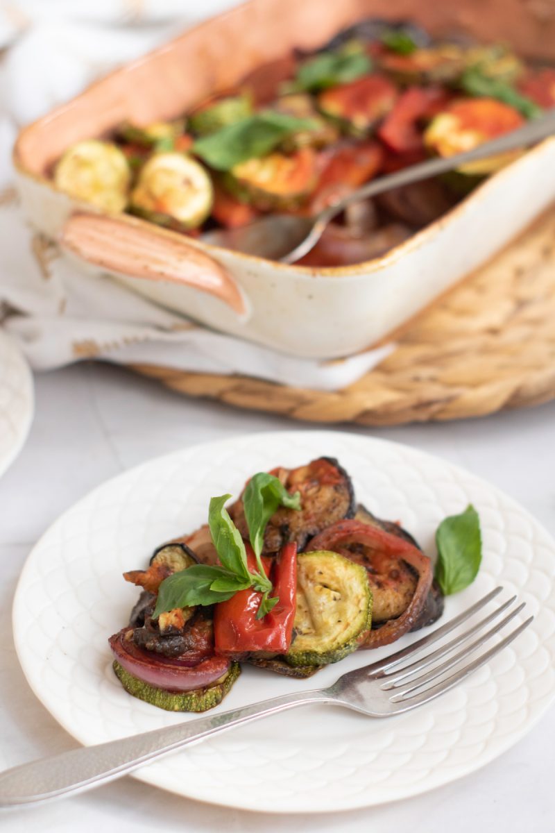 close up of ratatouille dish on white plate