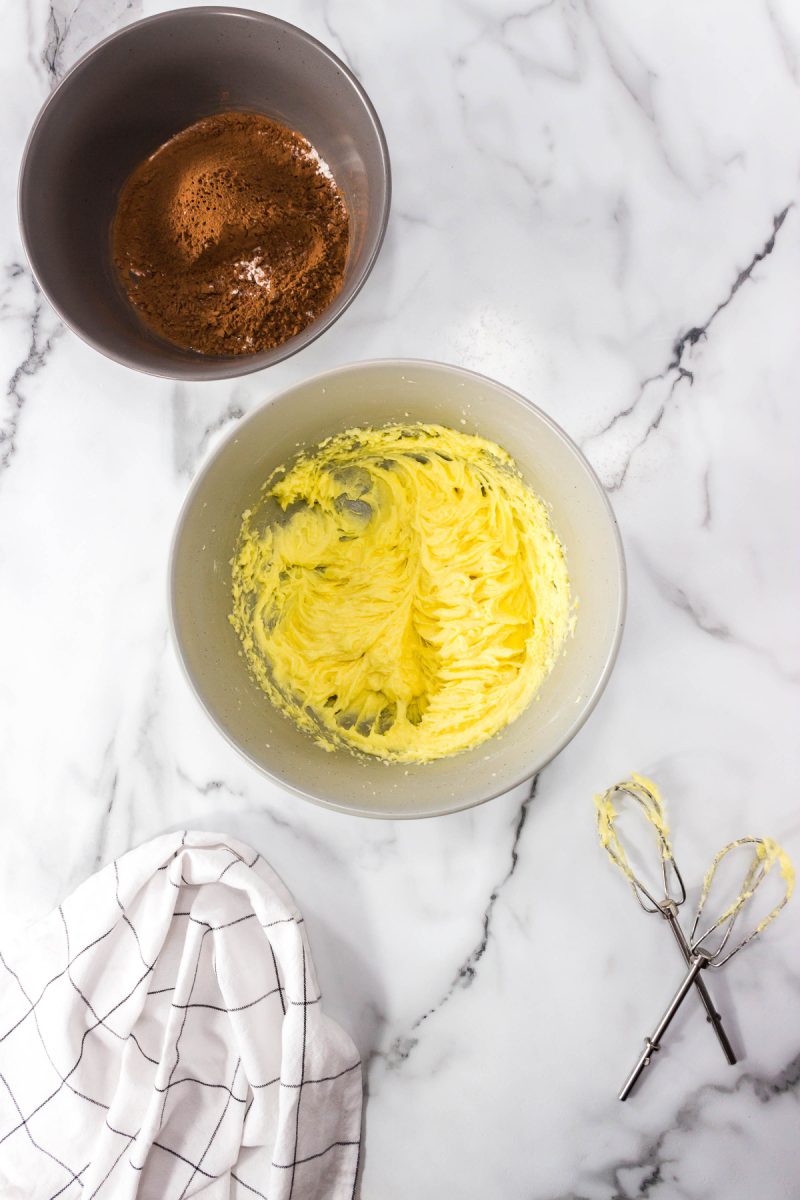 cream butter, sugar and eggs with mixer in bowl