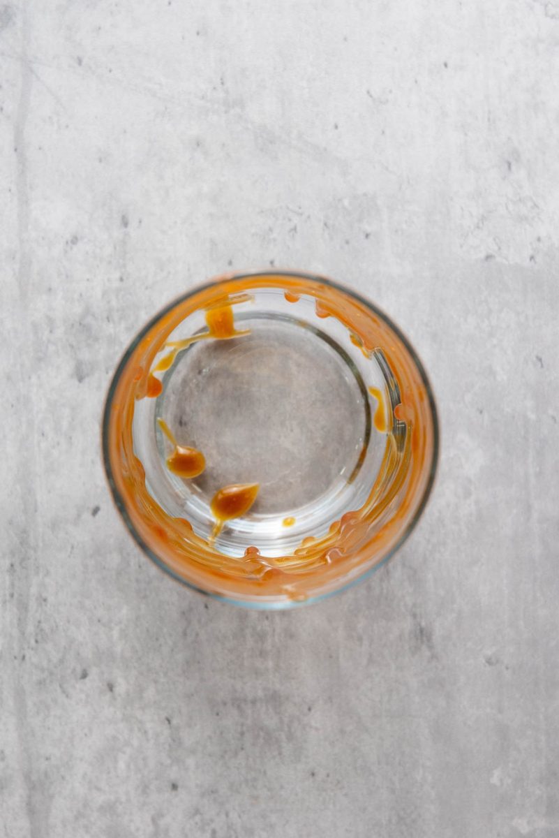 drizzle caramel syrup in glass