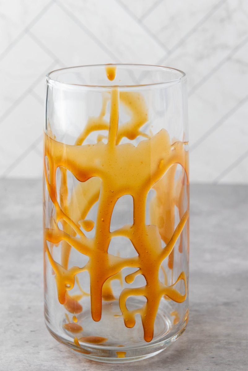 glass with caramel drizzle