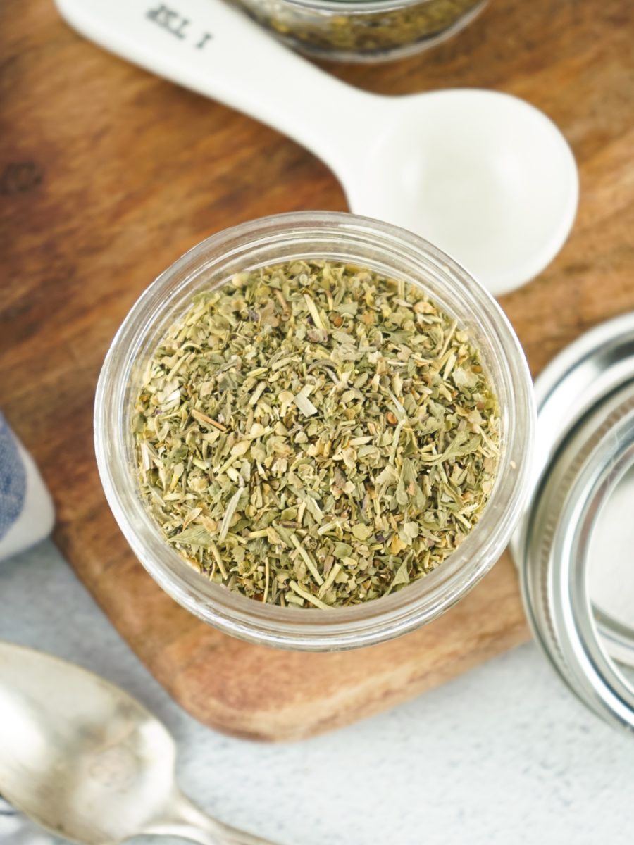 overhead view of mason jar filled with dried herbs