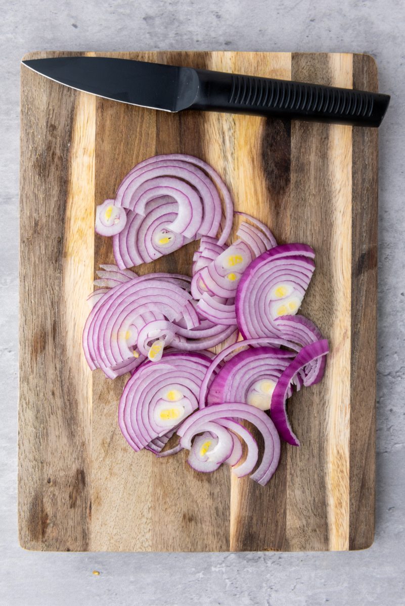 slicing a red onion